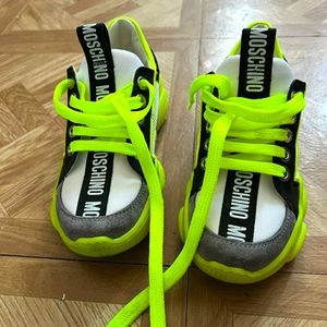 These Moschino sneakers are for sale still in good condition